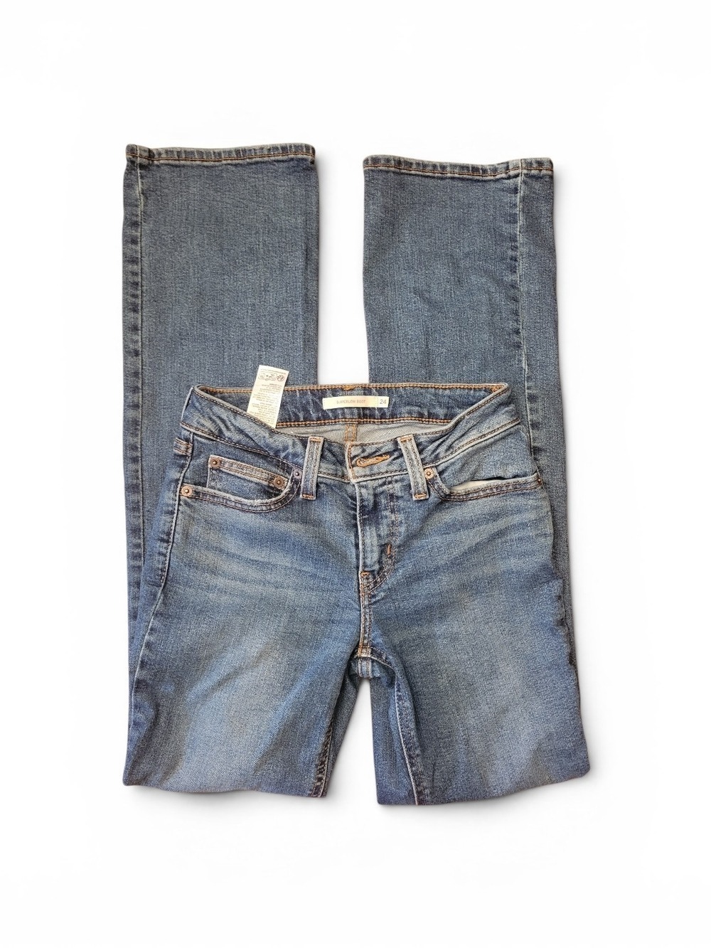 Levi's Women's Skinny Jeans in Faded Blue Wash. Size 24